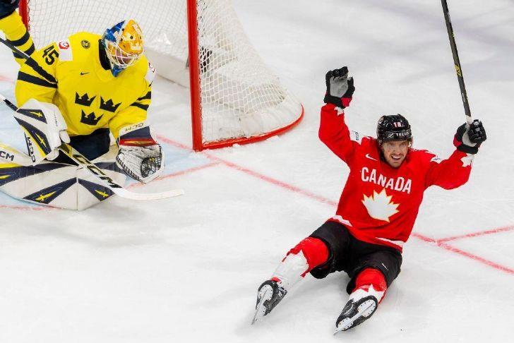 Switzerland beats defending champion the US in ice hockey worlds opener