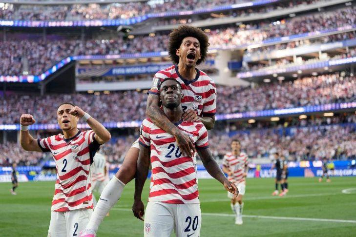 U.S. opens its home World Cup with a dynamic 4-1 victory over Paraguay, sparked by Balogun's 2 goals
